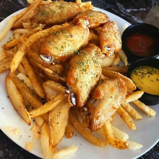 Wings and fries at UNLIMITED